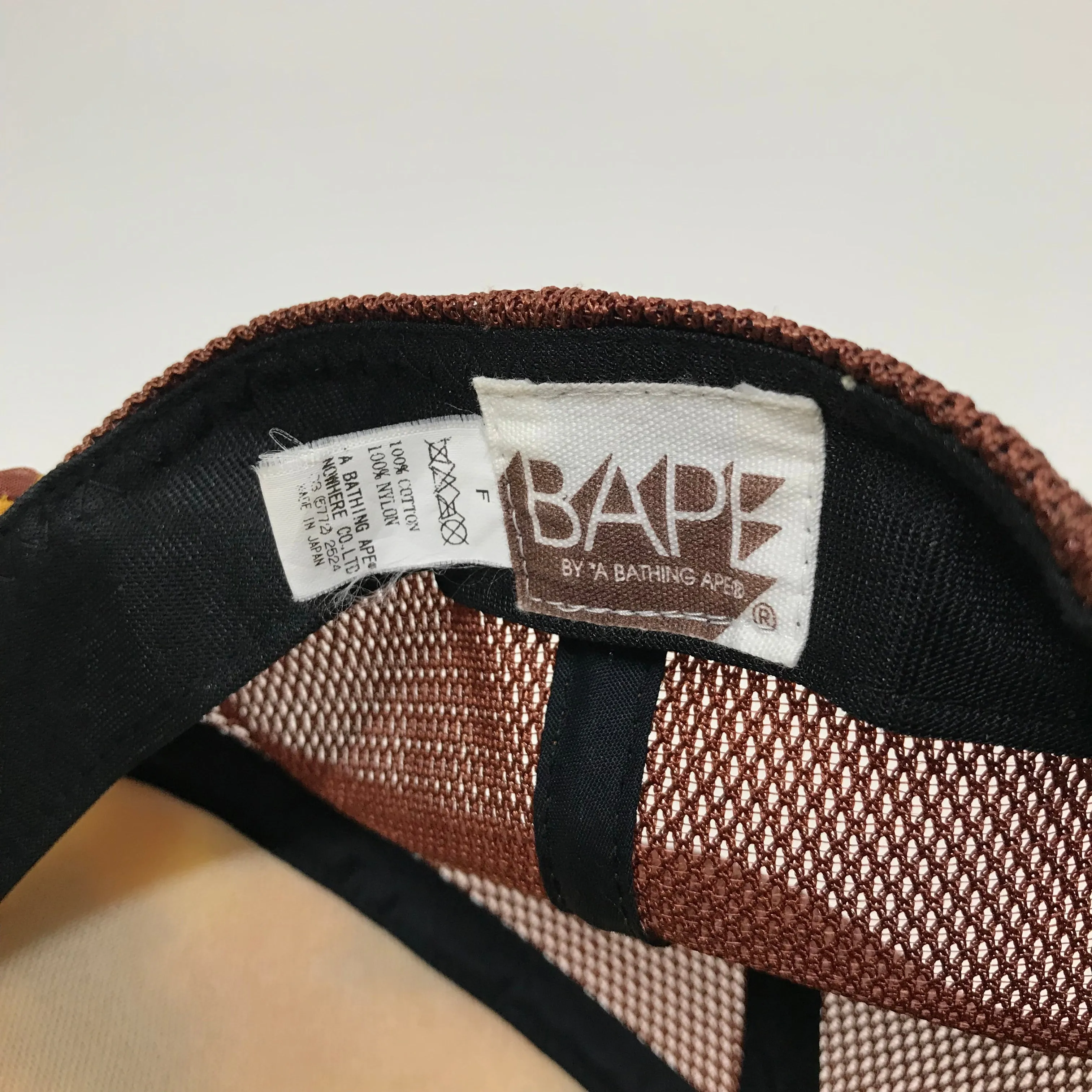 A Bathing Ape Bape Orange ABC Camo NYC Logo Mesh Trucker Cap