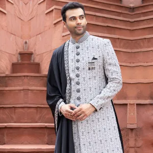 Classic Black and White Sherwani with Intricate Embroidery and Regal Appeal