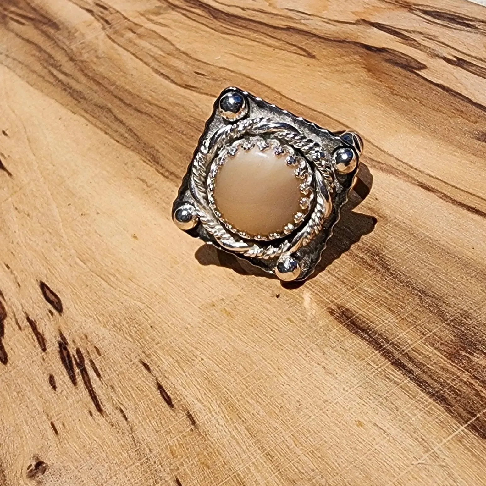Handcrafted Sterling Silver Statement Ring – Mother of Pearl Cabochon with LOVE Detail
