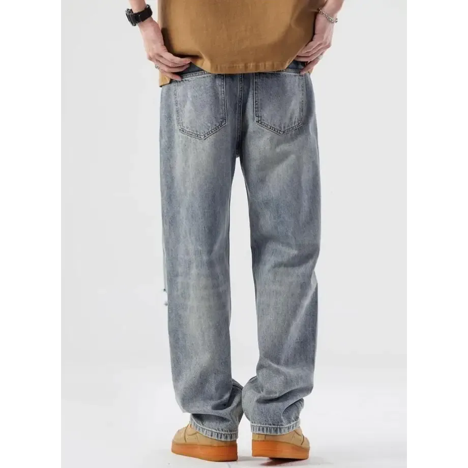 Light Wash Ripped Jeans for Y2K-Inspired Street Style