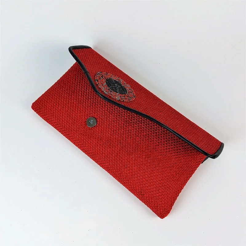 Sisal evening bag made from vintage embroidered fabrics with mirrorwork